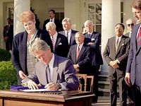0206 Bill Clinton signs the Family and Medical Leave Act in 1993.jpg